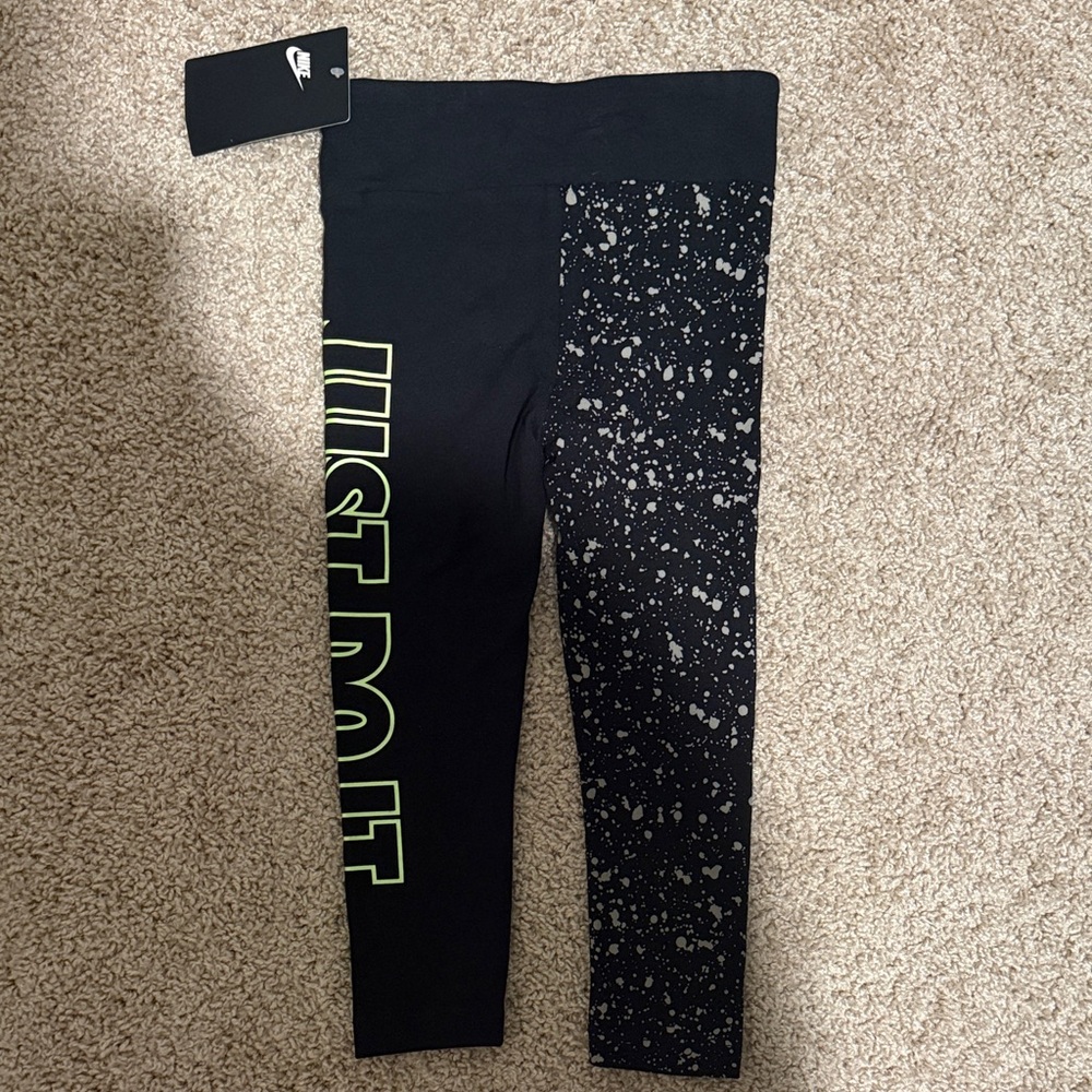 Nike Kids Black Leggings with White Speckles and Neon Green Logo - Picture 4 of 5